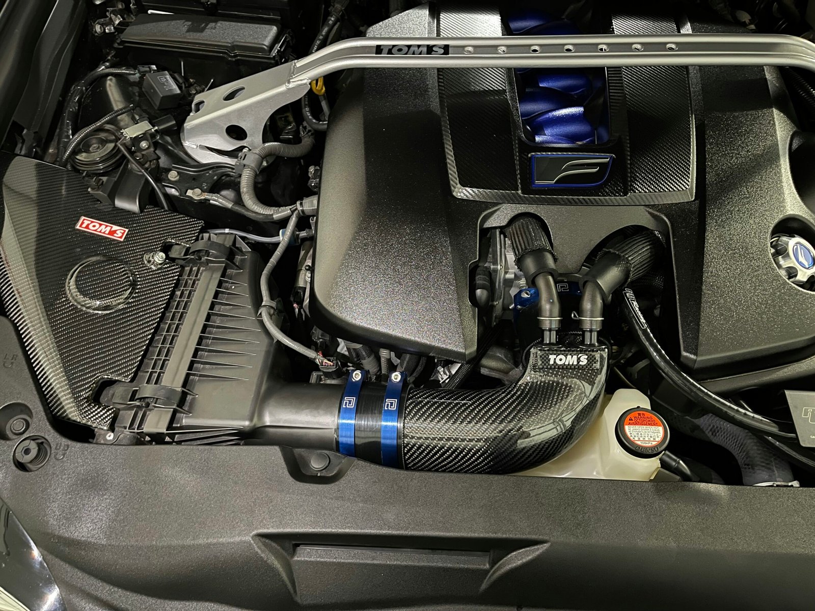 the engine compartment of a car with the hood up