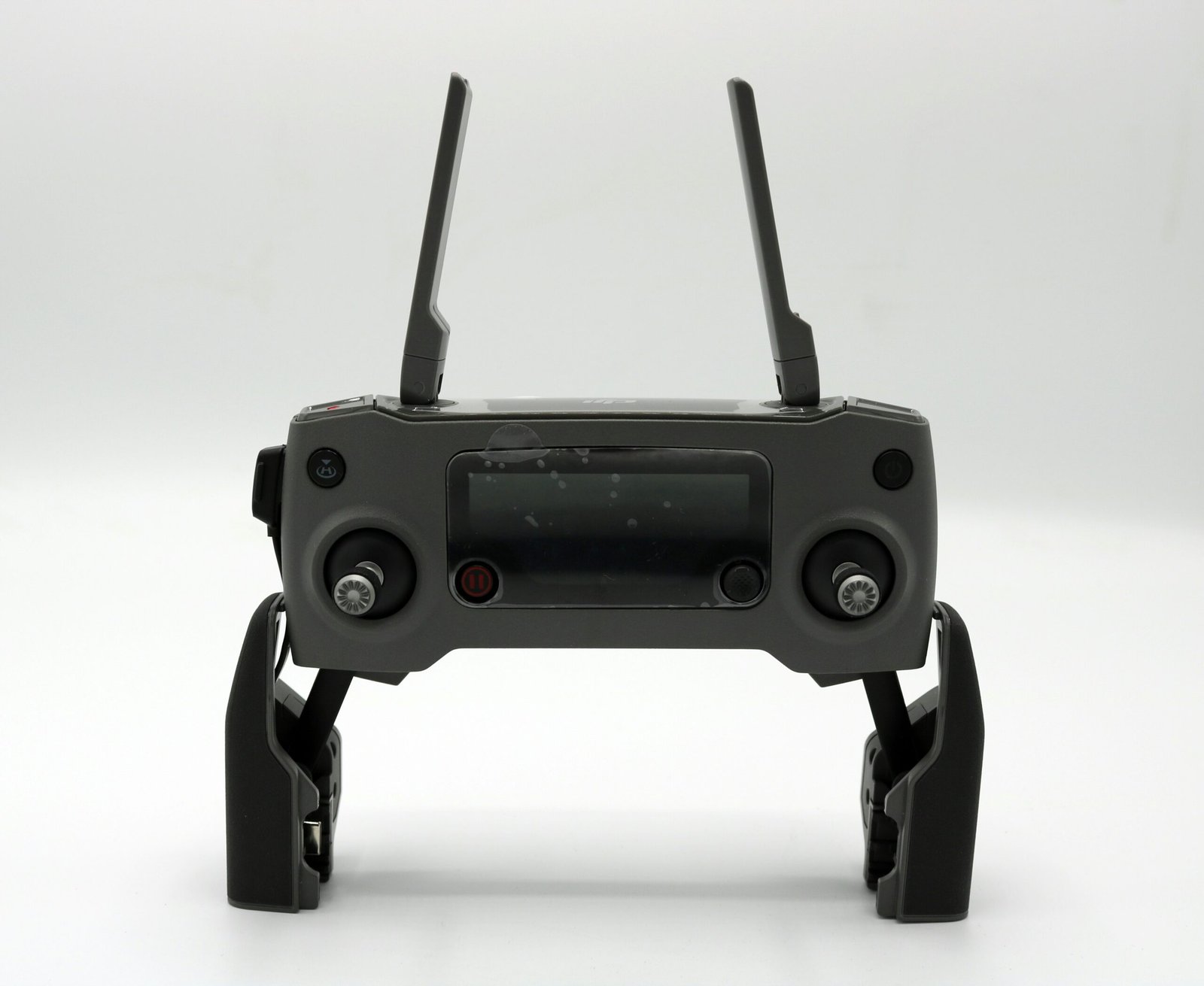 a black device with two handles and two buttons