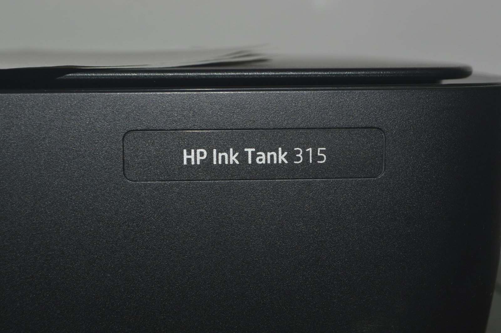 A close up of a hp ink tank
