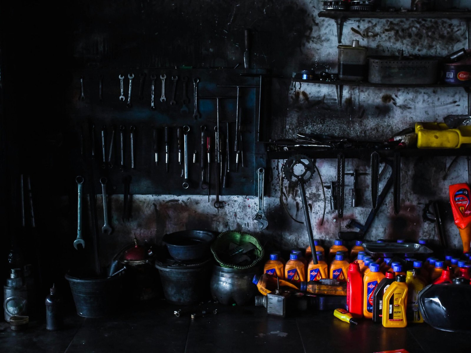 Tools and oil bottles in a workshop