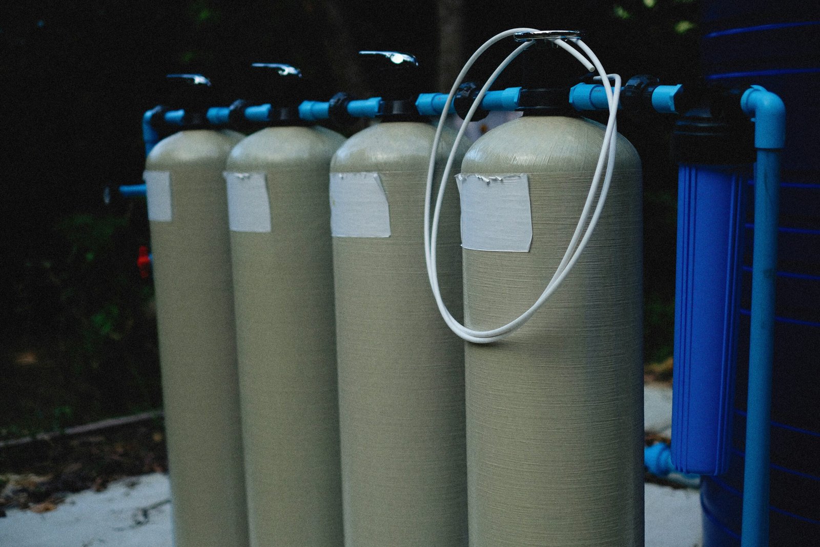 a row of water filtrators sitting next to each other