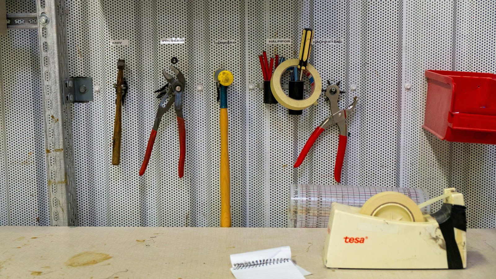 a bunch of tools are on a wall