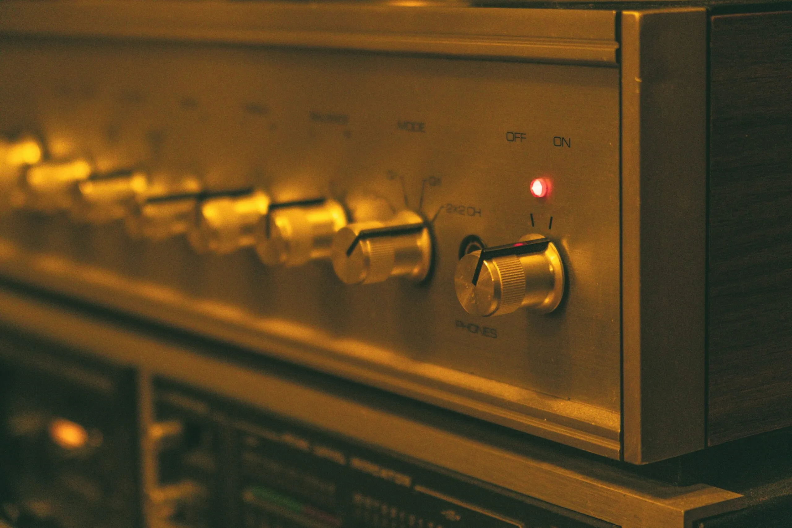 a close up of a stereo system with knobs