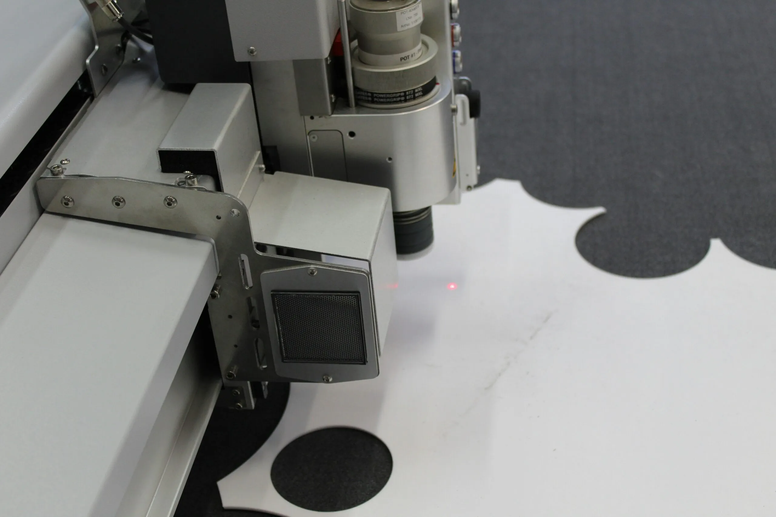 a close up of a machine with a camera on it