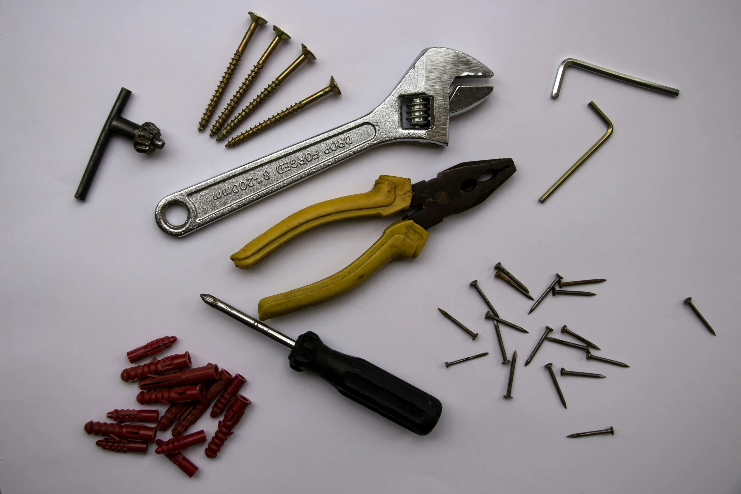 red and yellow handle pliers