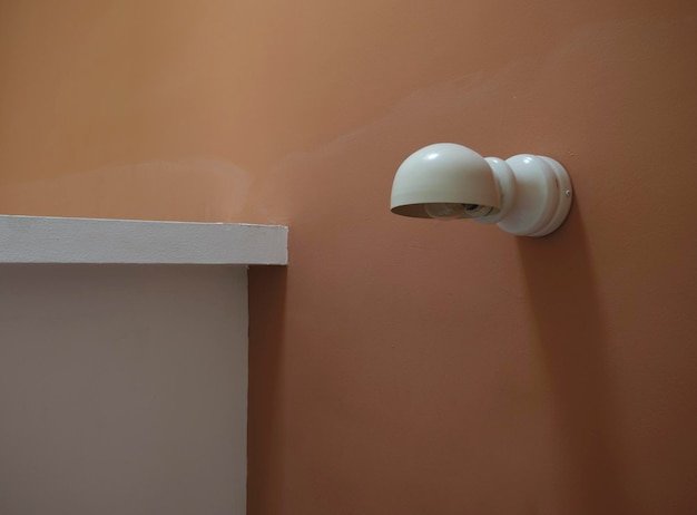 Electric lamp on wall