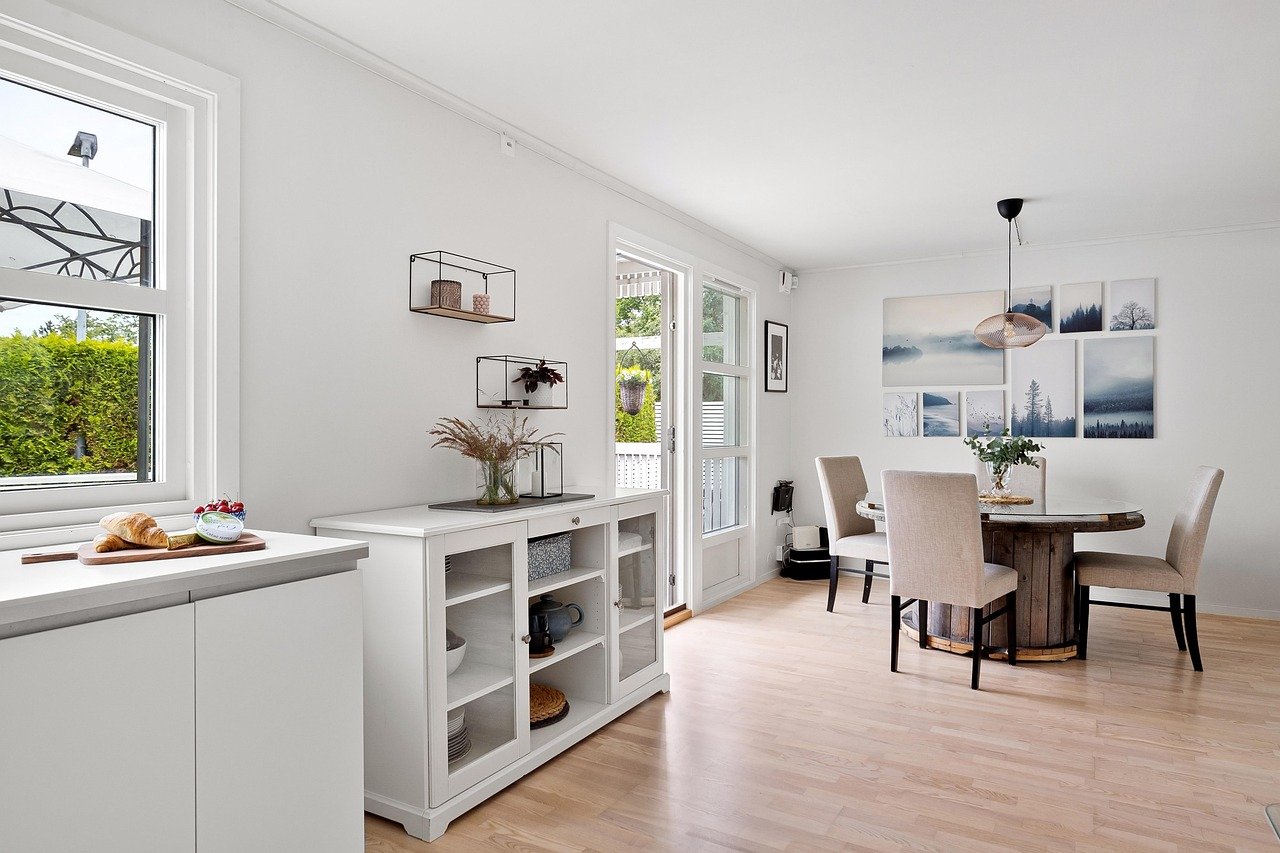 dining room, dining table, credenza, dining chairs, shelves, cabinet, console, server, table, white wall, chair, sliding door, window, interior, modern, luxury, wall decor, wall art, painting, floor, wood, design, real estate