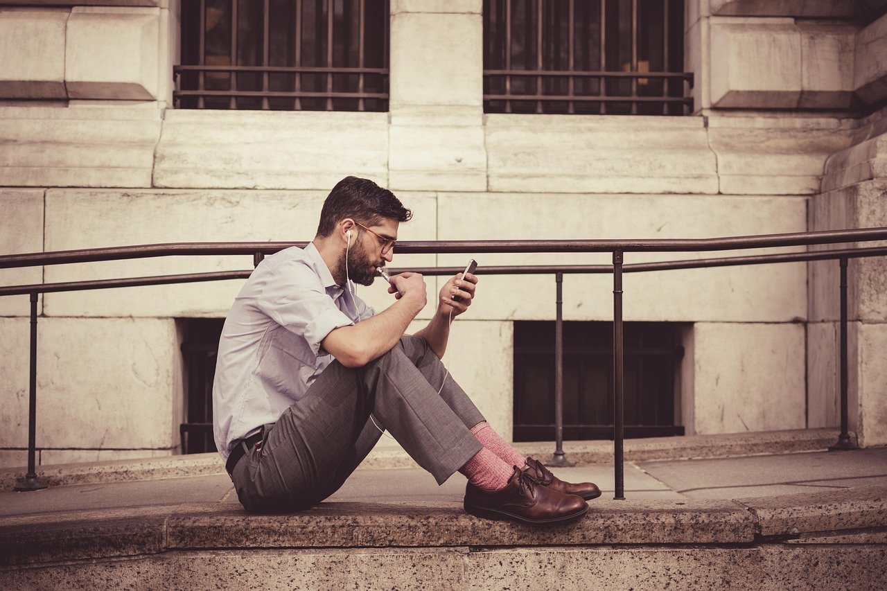 brown leather shoes, man, earphones, fashion, male, model, person, smartphone, leisure, sitting, urban, brown city, brown phone, brown fashion, brown mobile, brown model, brown shoes, brown smartphone, brown telephone, earphones, smartphone, smartphone, smartphone, smartphone, smartphone