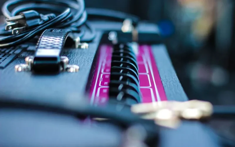 Detailed view of audio cables and equipment, showcasing technology and music connection.